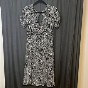 Free People Dress Black & White with decorative buttons down one side. Size 4